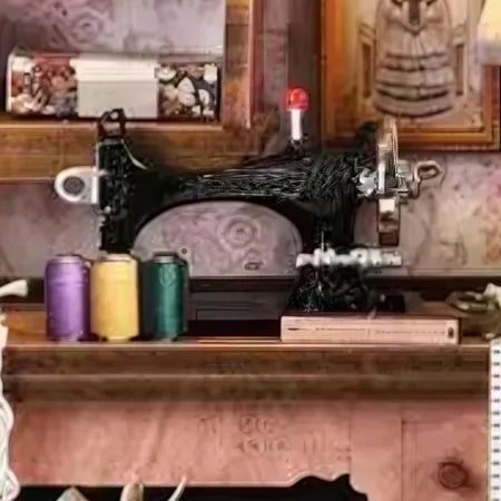 Close-up view of a decorative element in the Book Nook Kit - Lily Sewing Shop with fine details