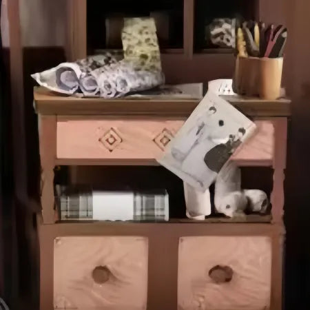 Close-up view of a decorative element in the Book Nook Kit - Lily Sewing Shop with fine details