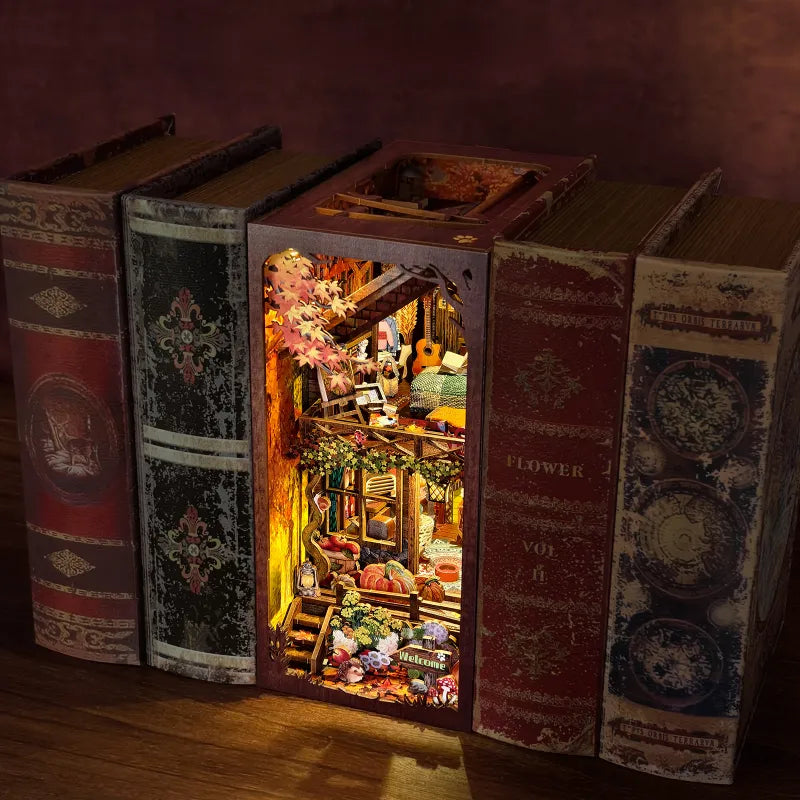 Book Nook Kit | Twilight Cottage decoratively placed on a desk
