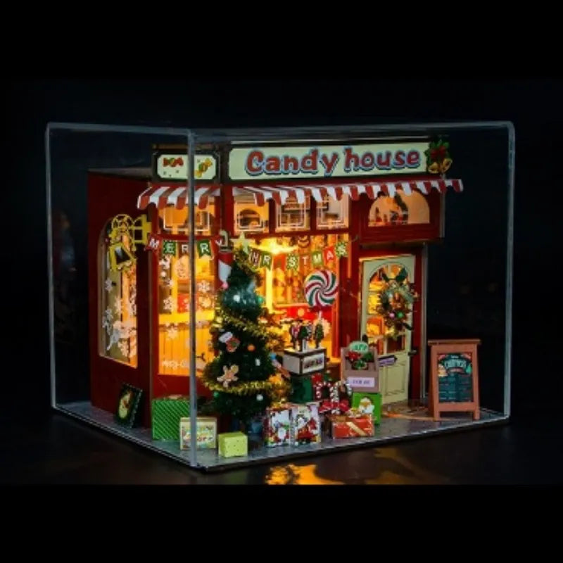 Miniature House Kit - Candy House with atmospheric lighting in a darkened room