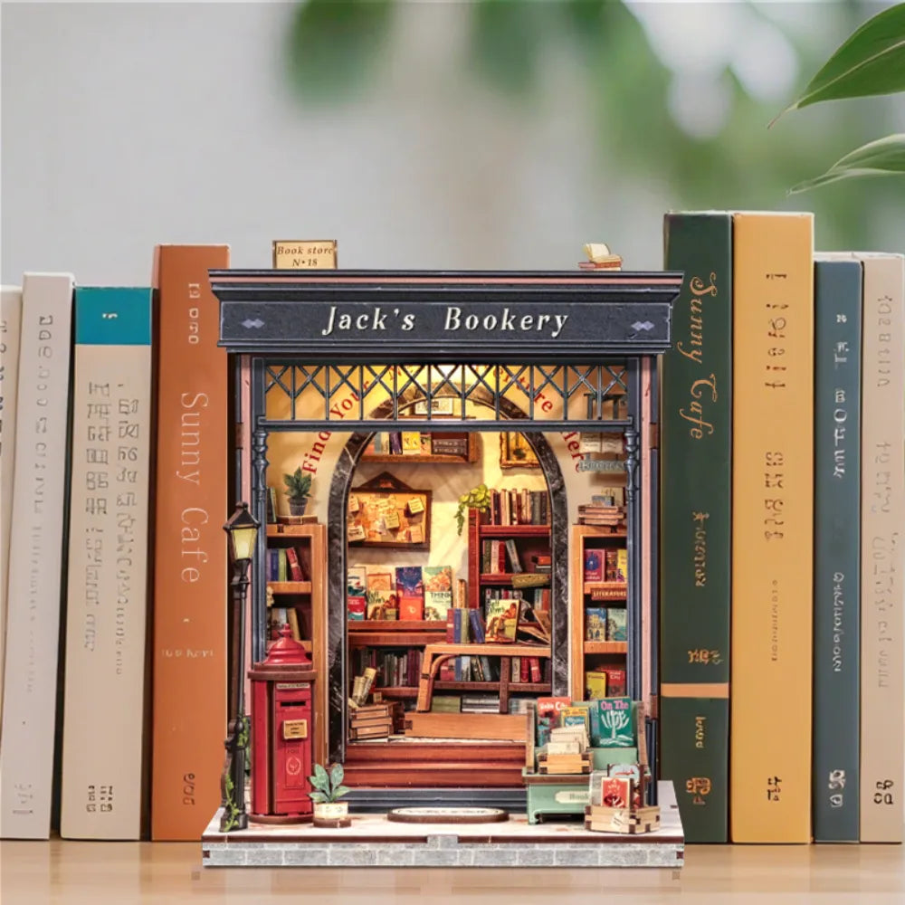 Miniature House Kit - Jack's Bookery decoratively placed on a desk